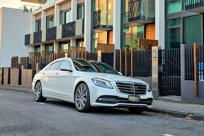 Airport Transfers - Chauffeur Car & Limo Services of Melbourne - On the Road Comfort: Water, Charging, and Quiet Ride