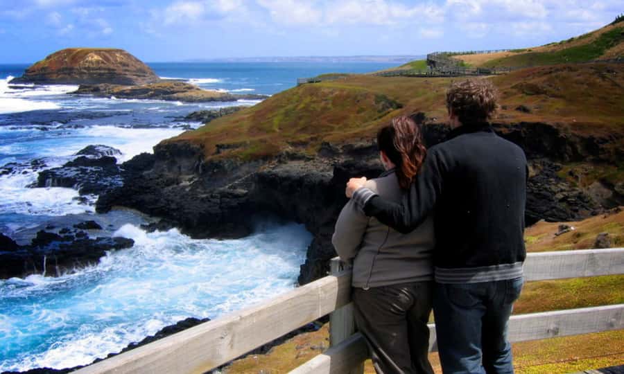 From Melbourne: Penguin Parade Afternoon Tour - Cape Woolamai in summer: dramatic cliffs if your date lines up