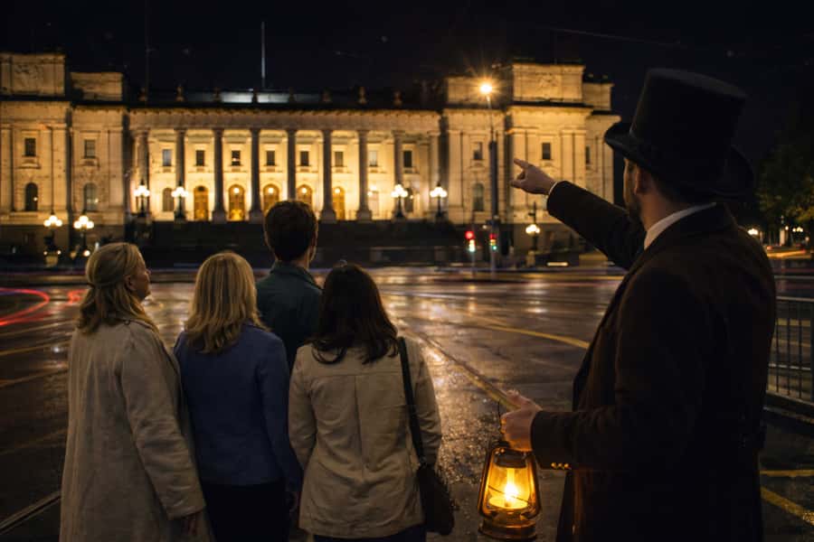 Melbourne: Ghosts, Murder, & Mystery Guided Walking Tour - Meeting Melbourne after dark at Flinders and Swanston