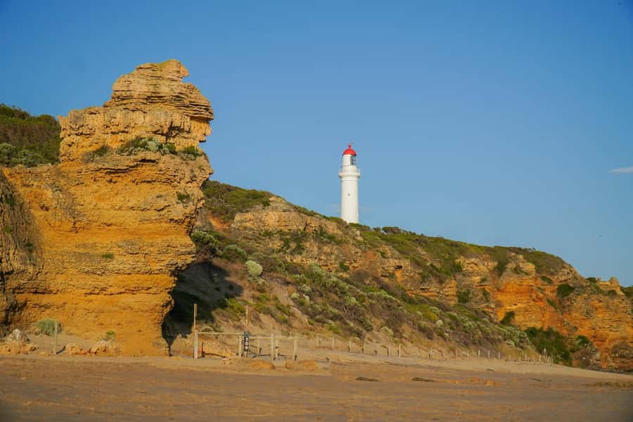 Melbourne: Great Ocean Road Adventure with Iconic Stops - Split Point Lighthouse and the Memorial Arch at Eastern View