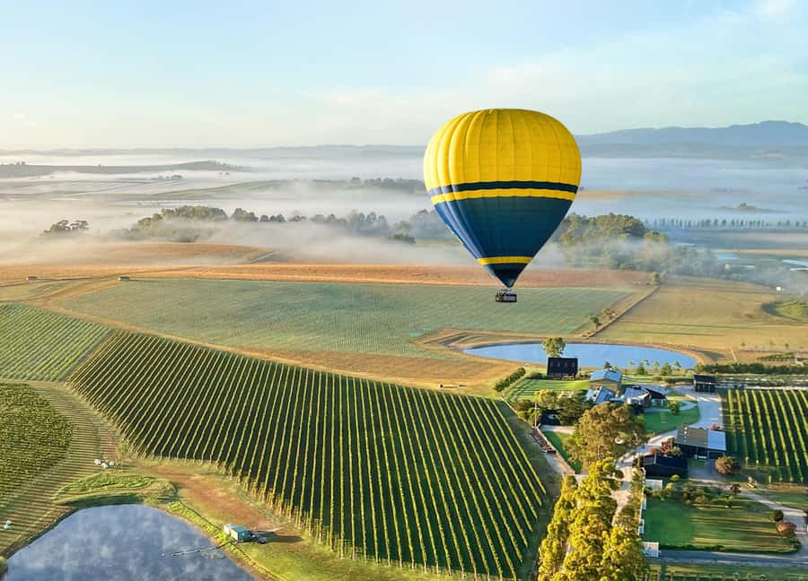 Yarra Valley: Hot Air Balloon with Breakfast & CBD Transfers - The balloon launch, setup, and why helping matters